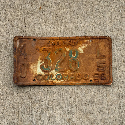 Photo of a 1958 Colorado Trailer License Plate Auto Tag Garage Decor Vintage 40 328 LS with original patina