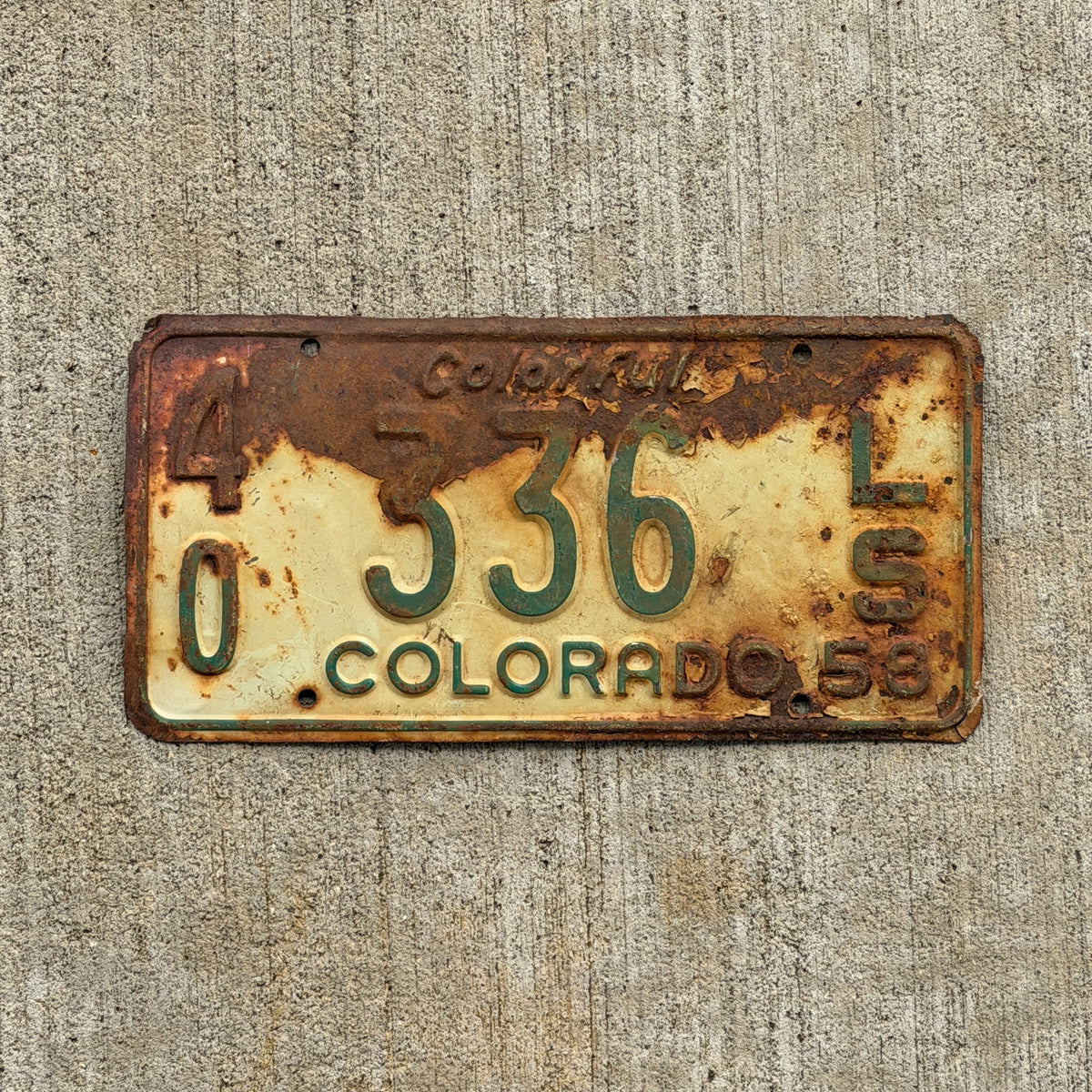 Photo of a 1958 Colorado Trailer License Plate Auto Tag Garage Decor Vintage 40 336 LS with original patina