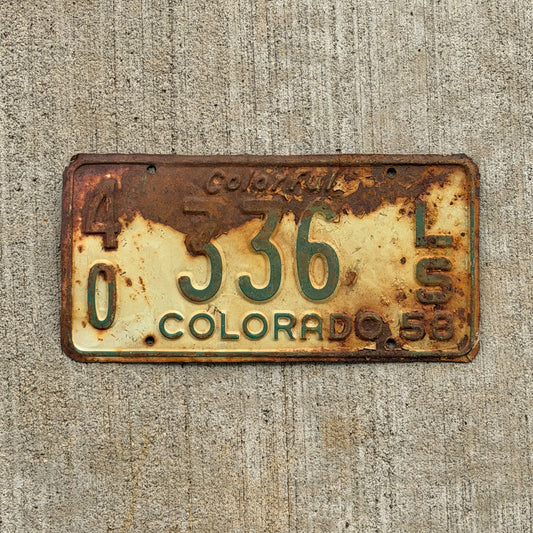 Photo of a 1958 Colorado Trailer License Plate Auto Tag Garage Decor Vintage 40 336 LS with original patina