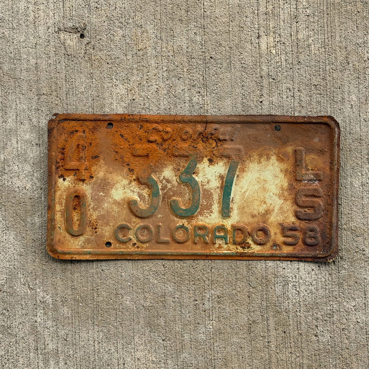 Photo of a 1958 Colorado Trailer License Plate Auto Tag Garage Decor Vintage 40 337 LS with original patina