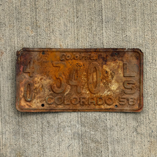 Photo of a 1958 Colorado Trailer License Plate Auto Tag Garage Decor Vintage 40 340 LS with original patina