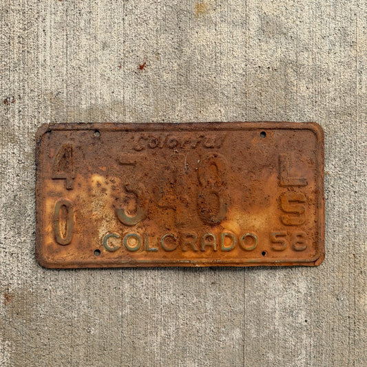 Photo of a 1958 Colorado Trailer License Plate Auto Tag Garage Decor Vintage 40 348 LS with original patina