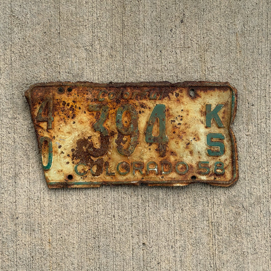 Photo of a 1958 Colorado Truck License Plate Auto Tag Garage Decor Vintage 40 394 KS with original patina