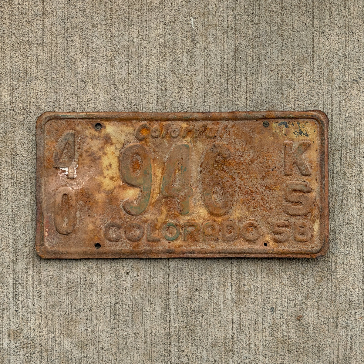 Photo of a 1958 Colorado Truck License Plate Auto Tag Garage Decor Vintage 40 946 KS with original patina