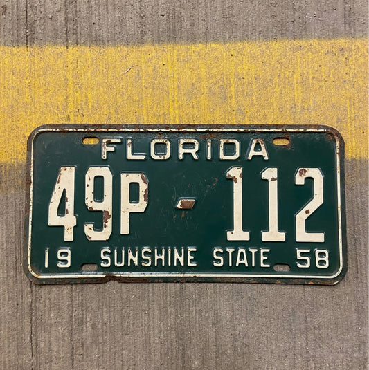 Photo of a 1958 Florida Off Road Vehicle License Plate Auto Tag Garage Decor Vintage 49P 112 with original patina