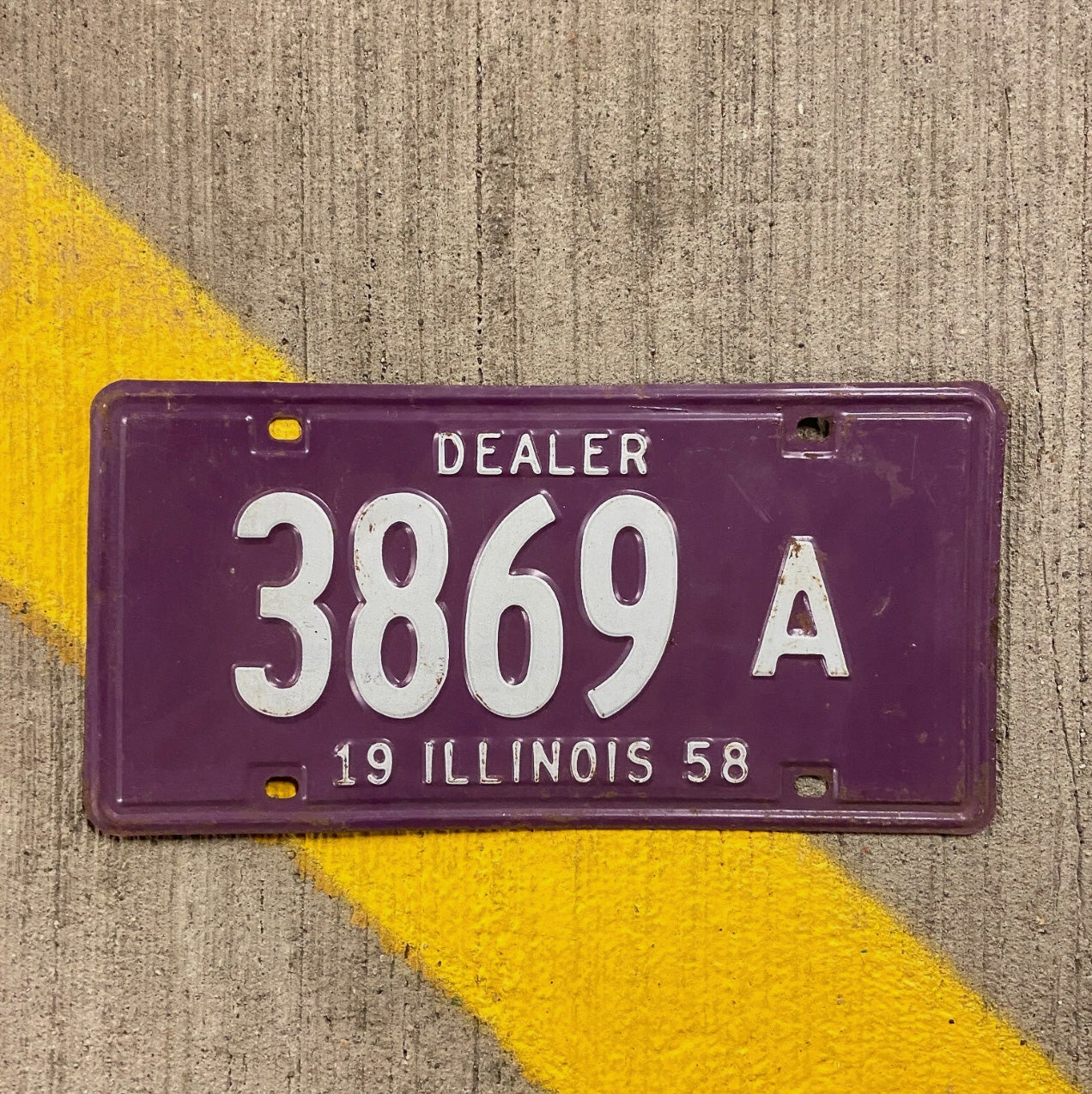Photo of a 1958 Illinois Dealer License Plate Auto Tag Garage Decor Vintage 3869 A with original patina