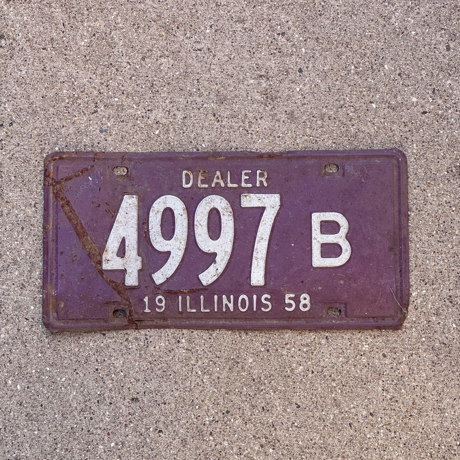 Photo of a 1958 Illinois Dealer License Plate Auto Tag Garage Decor Vintage 4997 B with original patina
