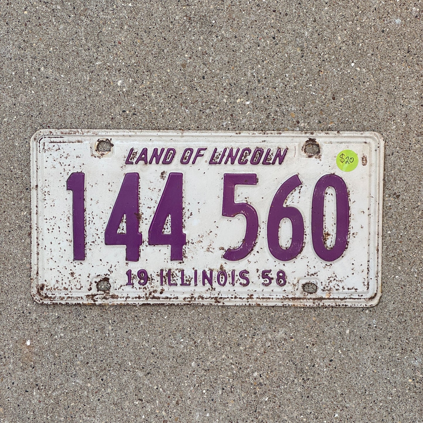 Photo of a 1958 Illinois License Plate Auto Tag Garage Decor Vintage 144 560 with original patina