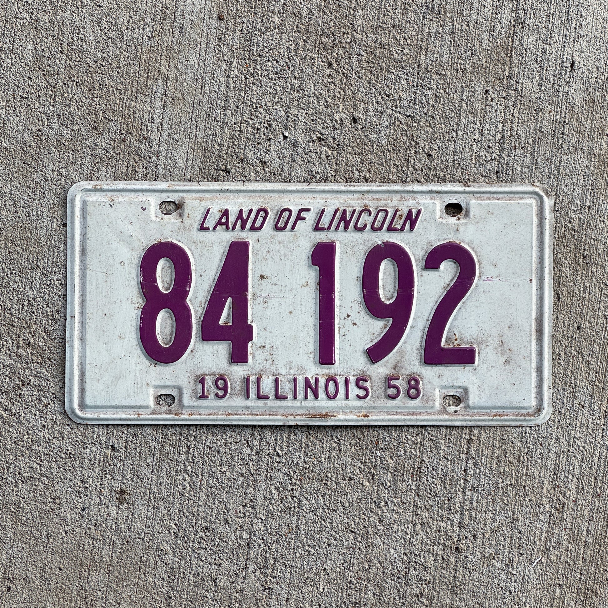 Photo of a 1958 Illinois License Plate Auto Tag Garage Decor Vintage 84 192 with original patina