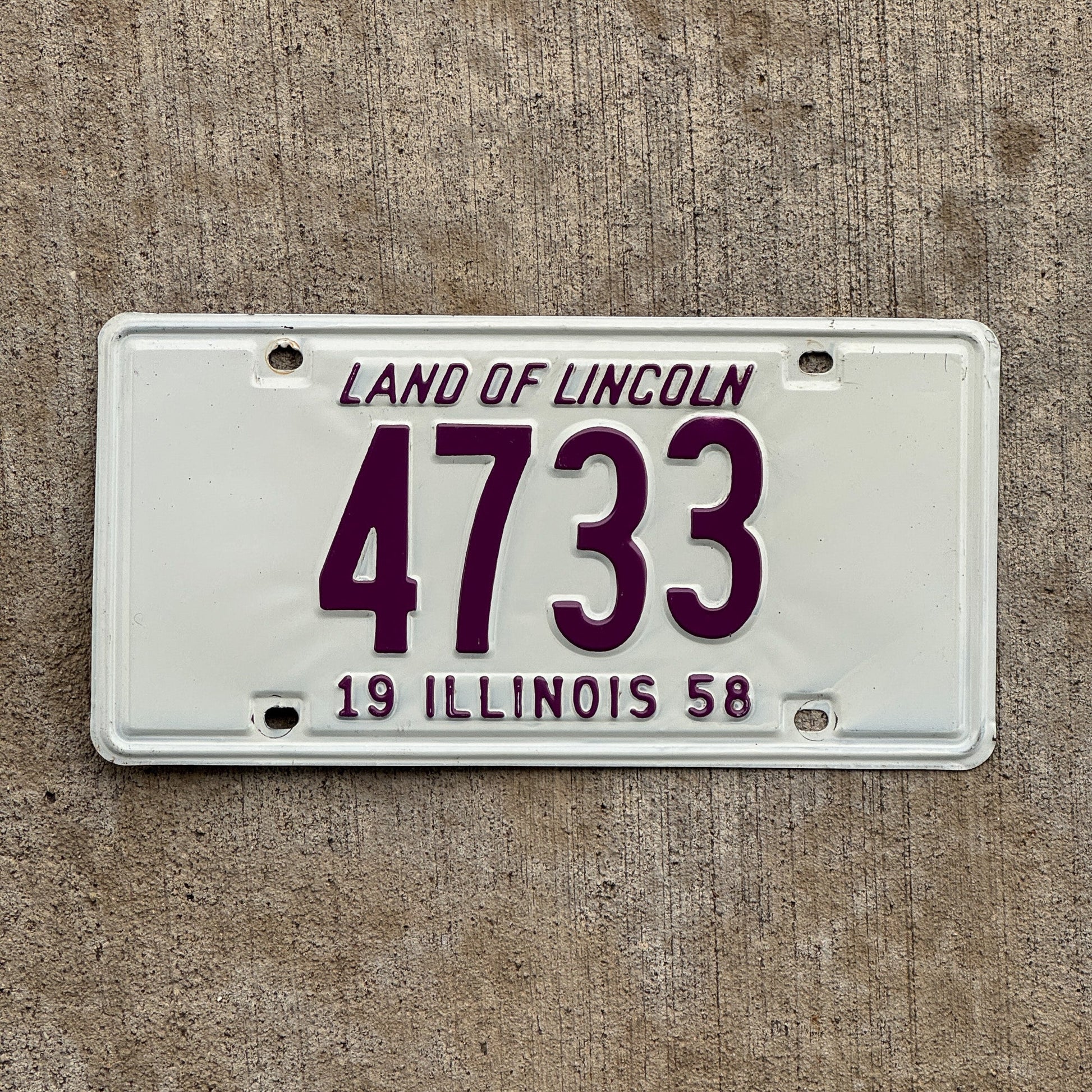 Photo of a 1958 Illinois License Plate Auto Tag Garage Decor Vintage Low Number Four Digit 4733 with original patina