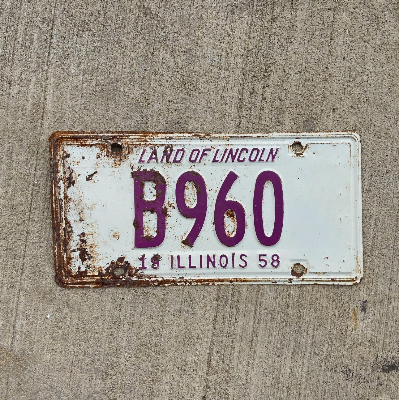 Photo of a 1958 Illinois Truck License Plate Auto Tag Garage Decor Vintage B 960 with original patina