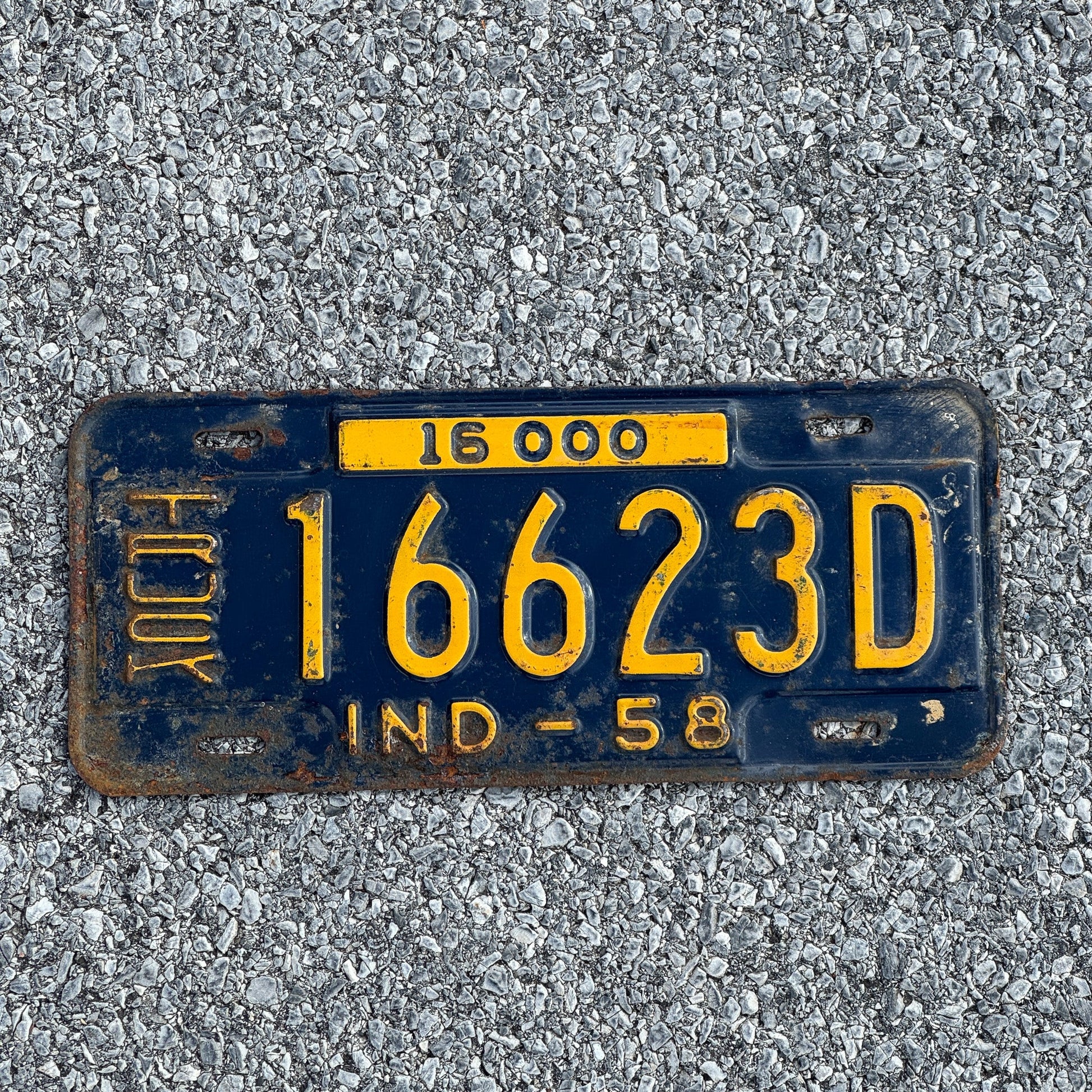 Photo of a 1958 Indiana Truck License Plate Auto Tag Garage Decor Vintage 16623D