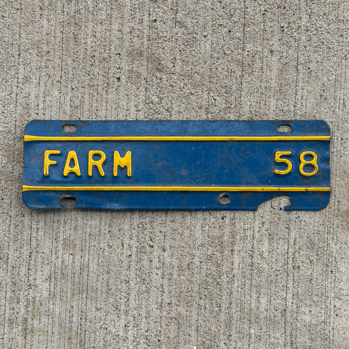 Photo of a 1958 Kansas Farm Truck License Plate Auto Tag Garage Decor Vintage Supplementary Topper with original patina
