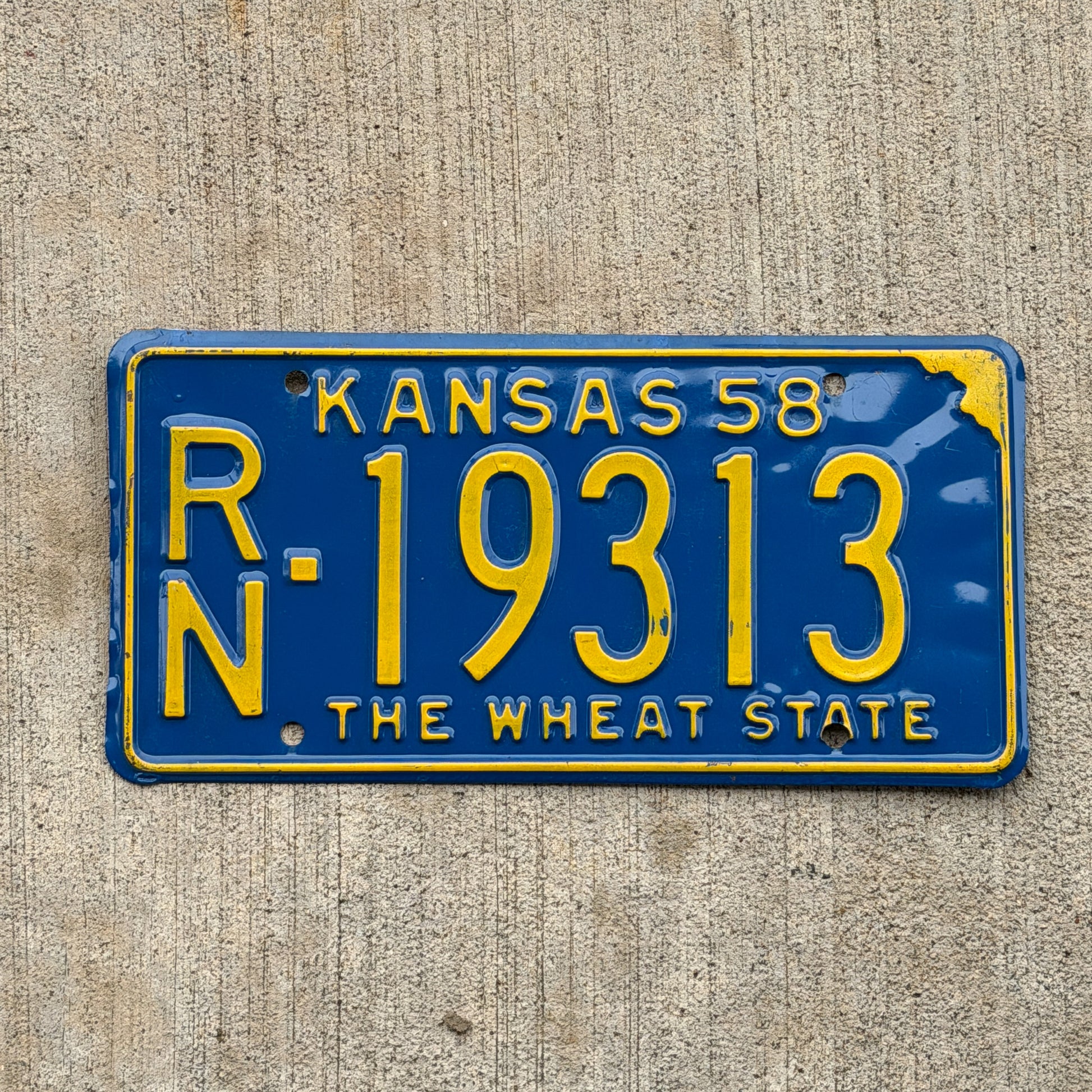 Photo of a 1958 Kansas License Plate Auto Tag Garage Decor Vintage RN 19313 with original patina