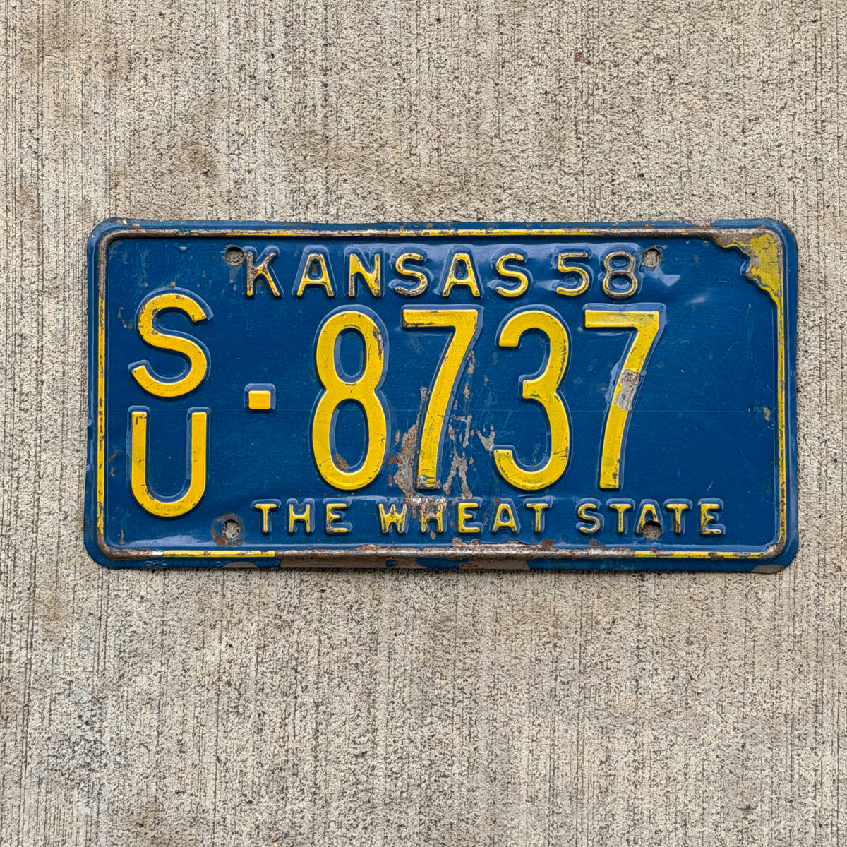 Photo of a 1958 Kansas License Plate Auto Tag Garage Decor Vintage SU 8737 with original patina