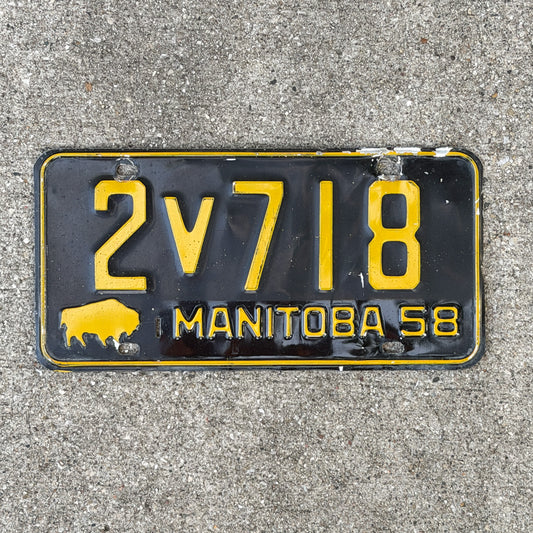 Photo of a 1958 Manitoba License Plate Auto Tag Garage Decor Vintage Buffalo Bison 2 V 718 with original patina