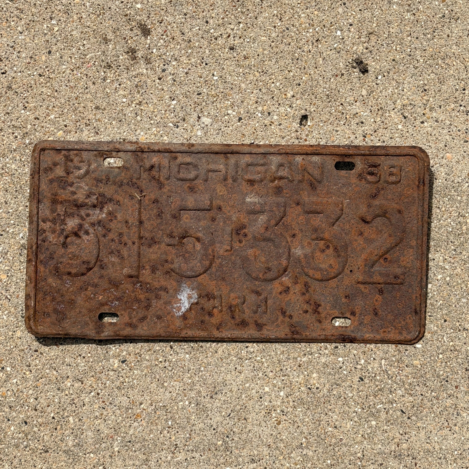 Photo of a 1958 Michigan Farm License Plate Auto Tag Garage Decor Vintage 515 332 with original patina