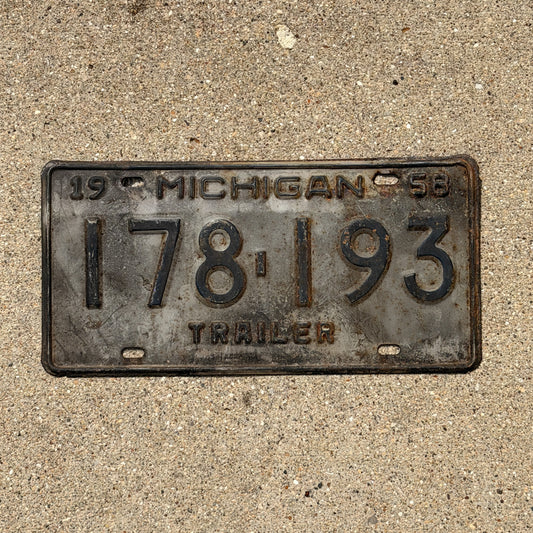 Photo of a 1958 Michigan Trailer License Plate Auto Tag Garage Decor Vintage 178 193 with original patina