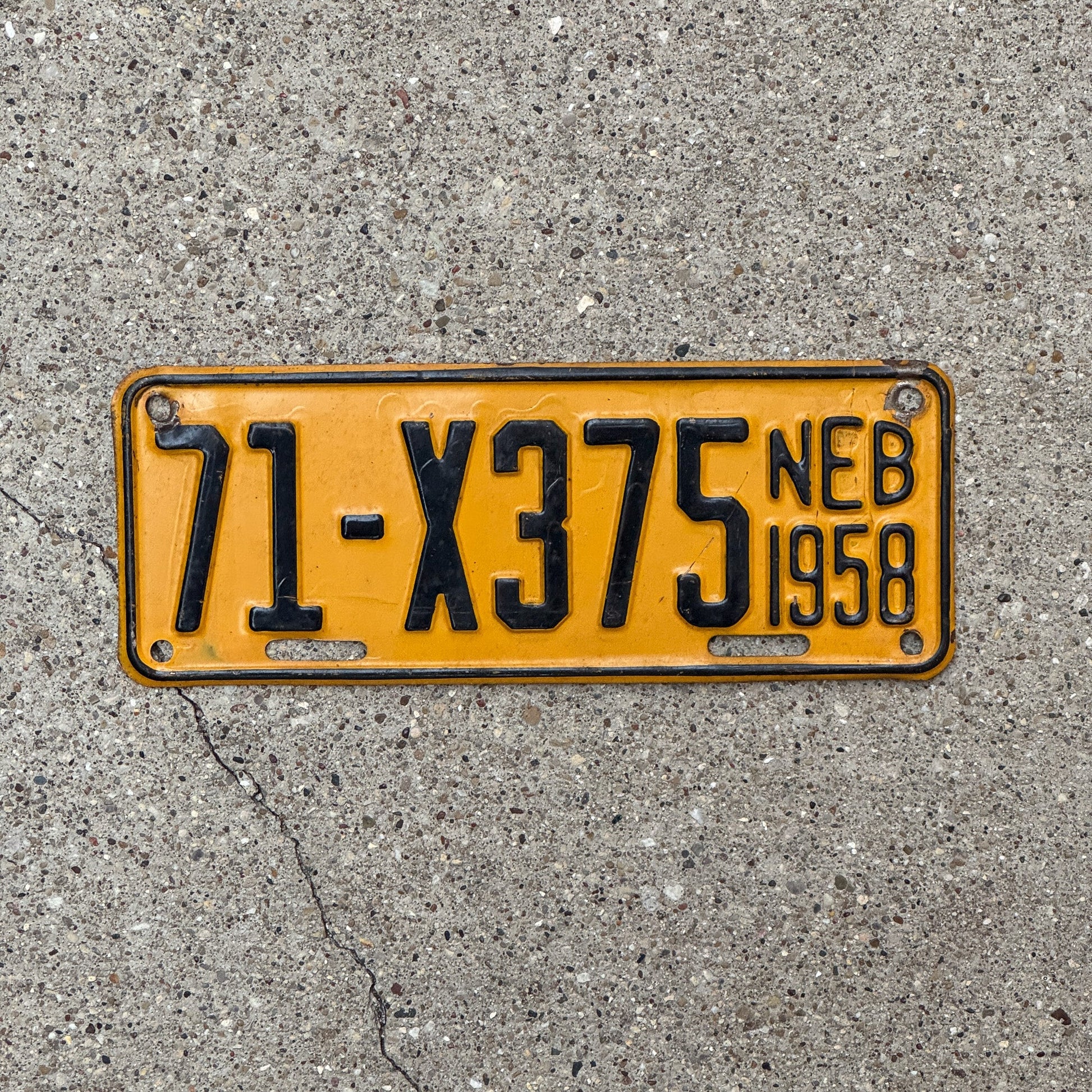 Photo of a 1958 Nebraska Farm Trailer License Plate Auto Tag Garage Decor Vintage 71 X375 with original patina