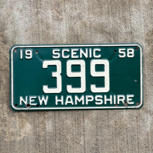 Photo of a 1958 New Hampshire License Plate Auto Tag Garage Decor Vintage Low Number Three Digit 399 with original patina