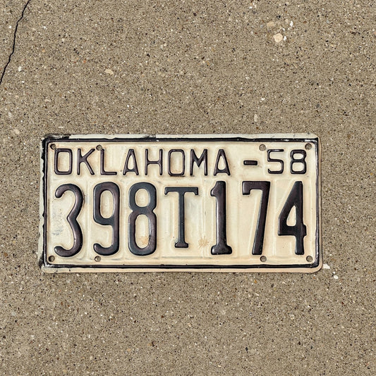 Photo of a 1958 Oklahoma Truck License Plate Auto Tag Garage Decor Vintage 398 T 174 with original patina