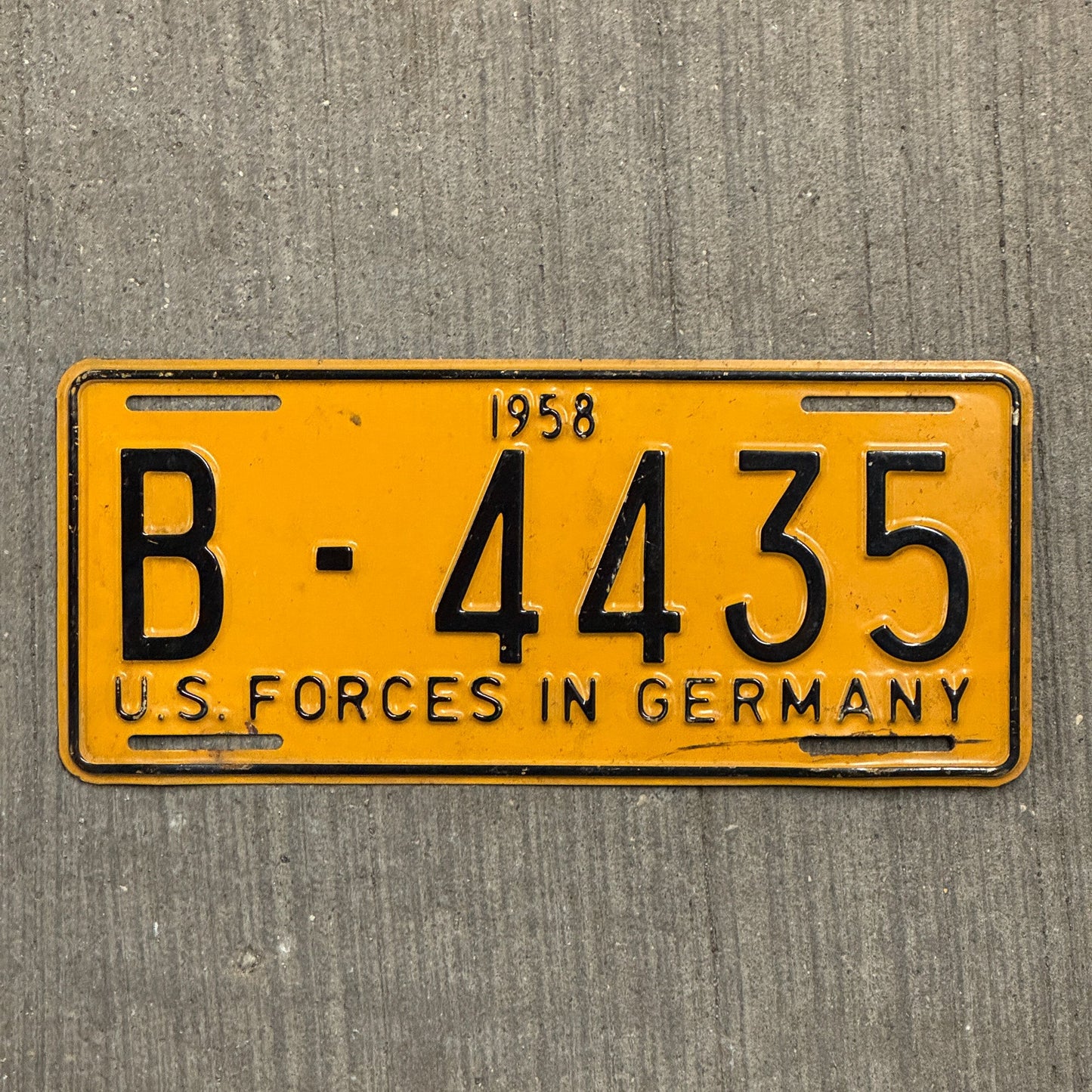 Photo of a 1958 US Forces Germany License Plate Auto Tag Garage Decor Vintage B 4435 with original patina
