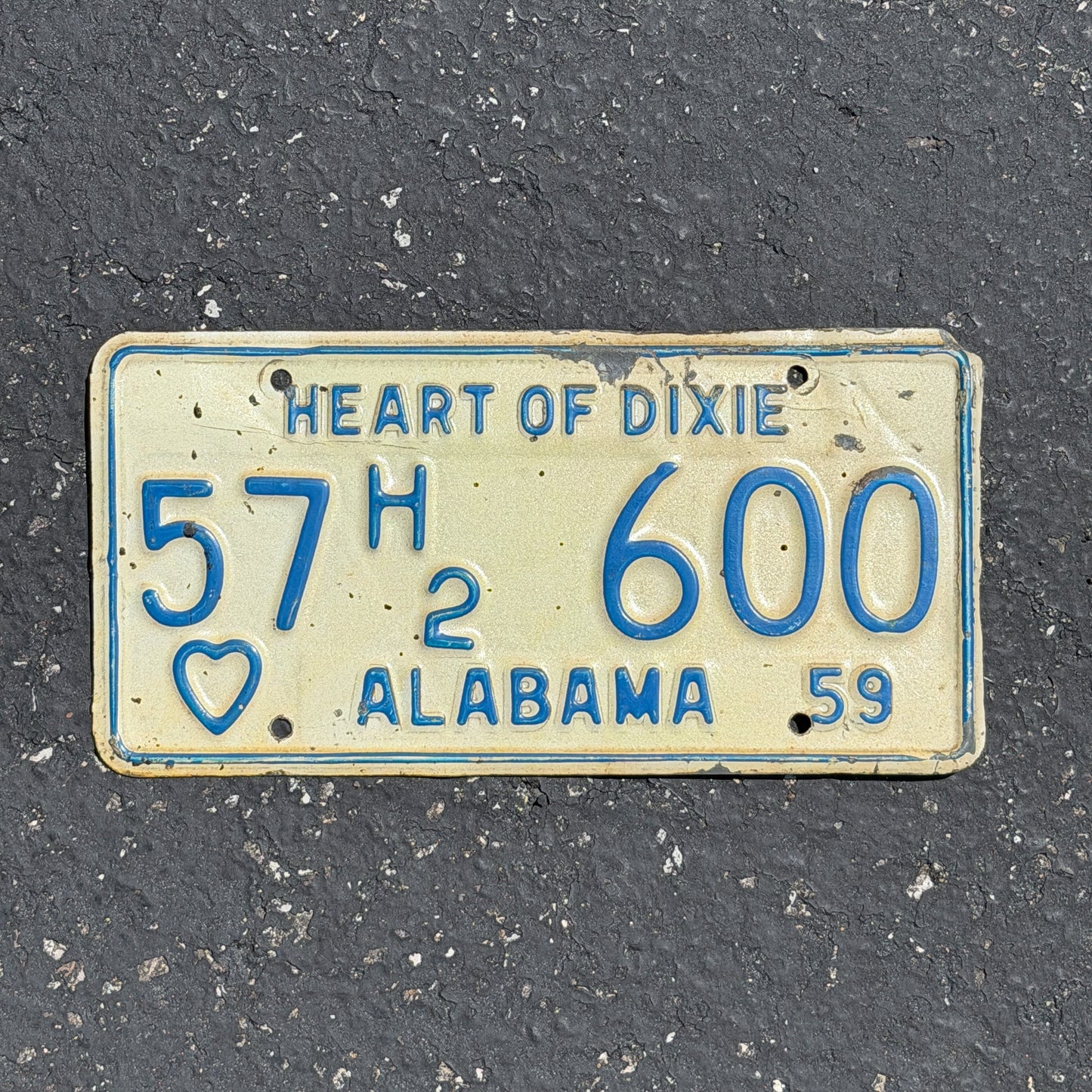 Photo of a 1959 Alabama Truck License Plate Auto Tag Garage Decor Vintage 57 H2 600 with original patina