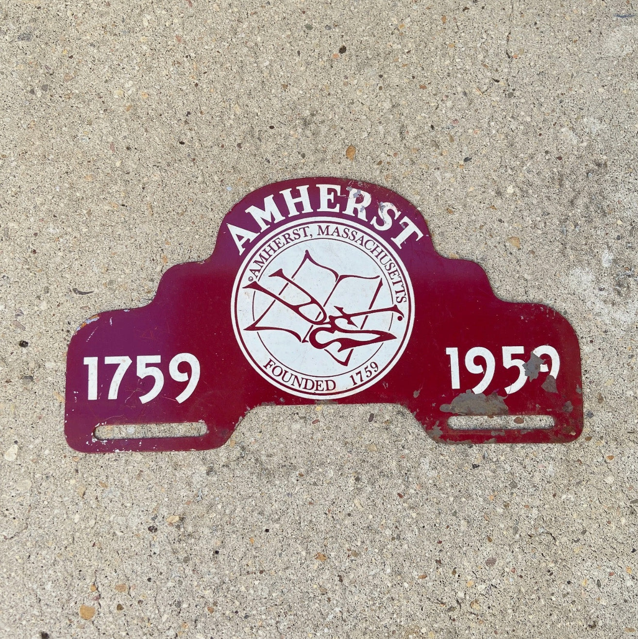 Photo of a 1959 Amherst Massachusetts License Plate Topper Auto Tag Garage Decor Vintage Bicentennial Mass with original patina
