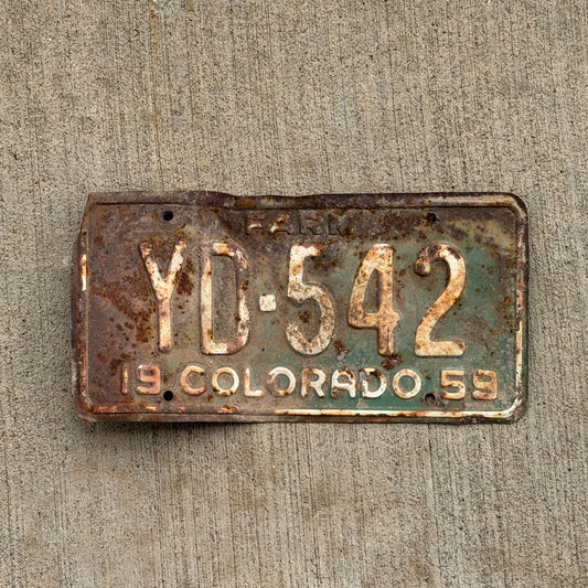 Photo of a 1959 Colorado Farm Truck License Plate Auto Tag 1 Vintage YD 542 with original patina