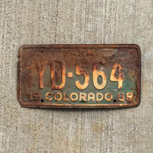 Photo of a 1959 Colorado Farm Truck License Plate Auto Tag 1 Vintage YD 564 with original patina