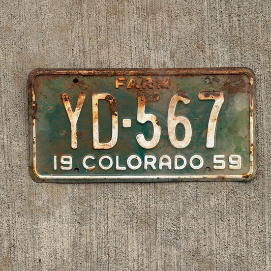 Photo of a 1959 Colorado Farm Truck License Plate Auto Tag 1 Vintage YD 567 with original patina