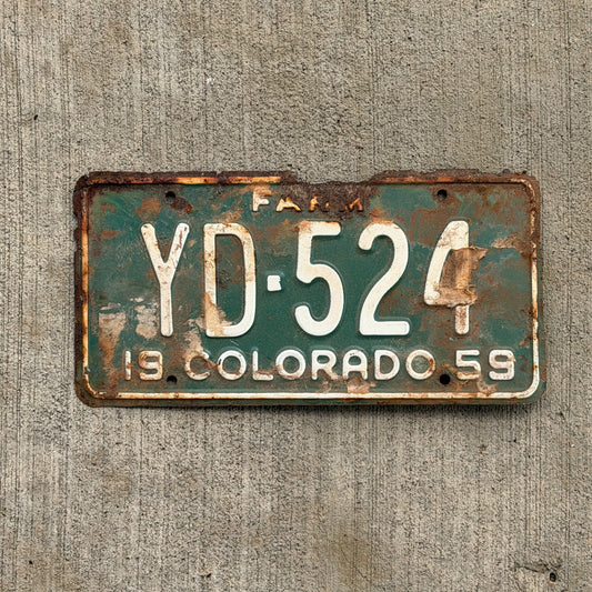 Photo of a 1959 Colorado Farm Truck License Plate Auto Tag 2 Vintage YD 524 with original patina