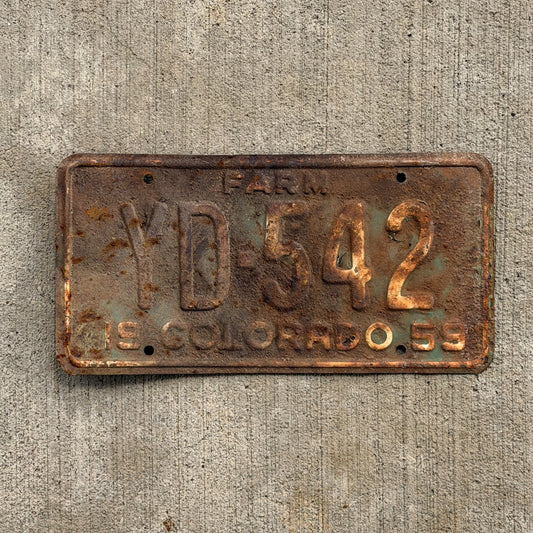 Photo of a 1959 Colorado Farm Truck License Plate Auto Tag 2 Vintage YD 542 with original patina
