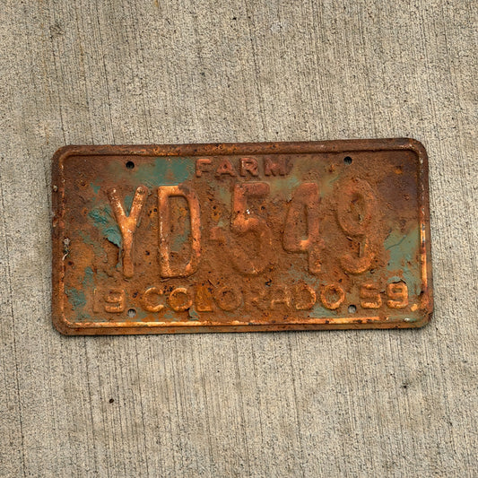 Photo of a 1959 Colorado Farm Truck License Plate Auto Tag 2 Vintage YD 549 with original patina