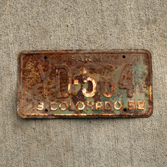 Photo of a 1959 Colorado Farm Truck License Plate Auto Tag 2 Vintage YD 564 with original patina