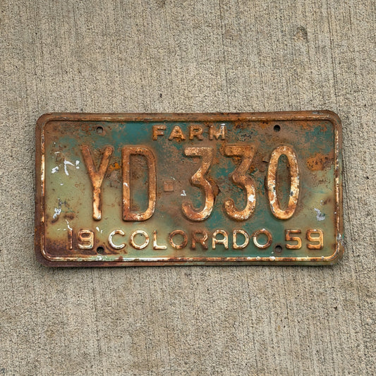 Photo of a 1959 Colorado Farm Truck License Plate Auto Tag Garage Decor Vintage YD 330 with original patina