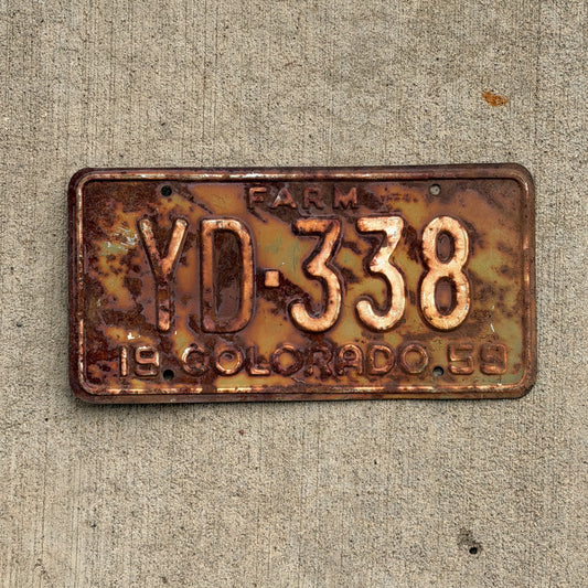 Photo of a 1959 Colorado Farm Truck License Plate Auto Tag Garage Decor Vintage YD 338 with original patina