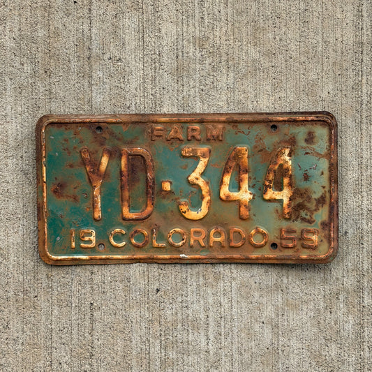 Photo of a 1959 Colorado Farm Truck License Plate Auto Tag Garage Decor Vintage YD 344 with original patina