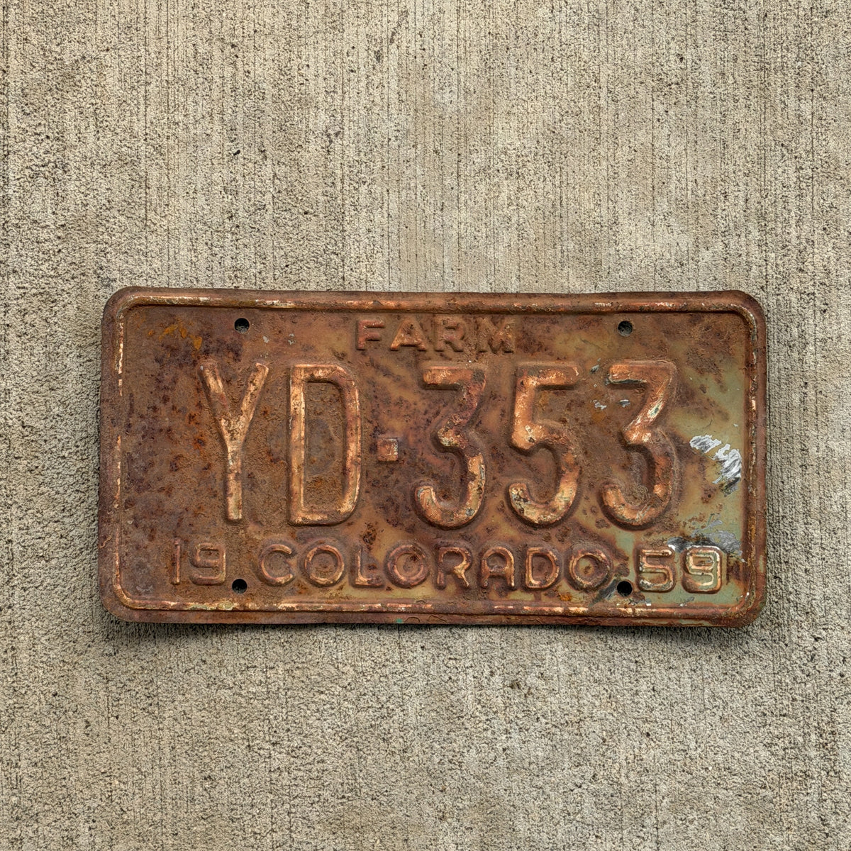 Photo of a 1959 Colorado Farm Truck License Plate Auto Tag Garage Decor Vintage YD 353 with original patina