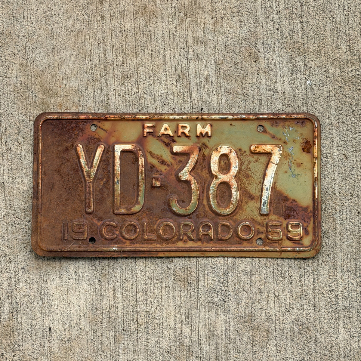 Photo of a 1959 Colorado Farm Truck License Plate Auto Tag Garage Decor Vintage YD 387 with original patina