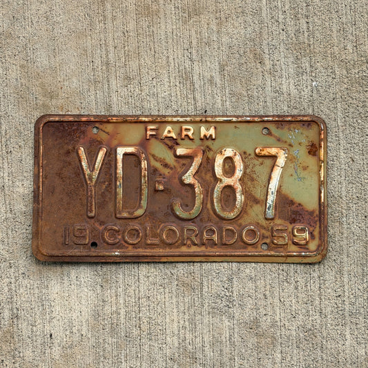Photo of a 1959 Colorado Farm Truck License Plate Auto Tag Garage Decor Vintage YD 387 with original patina