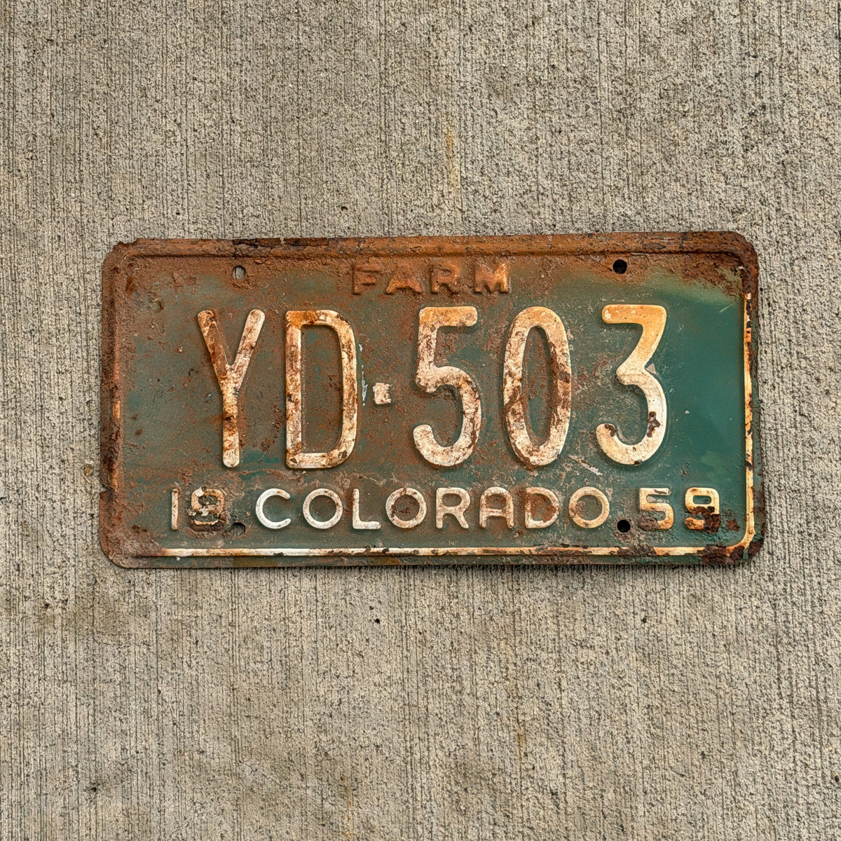 Photo of a 1959 Colorado Farm Truck License Plate Auto Tag Garage Decor Vintage YD 503 with original patina
