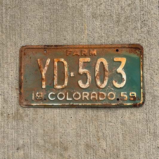 Photo of a 1959 Colorado Farm Truck License Plate Auto Tag Garage Decor Vintage YD 503 with original patina