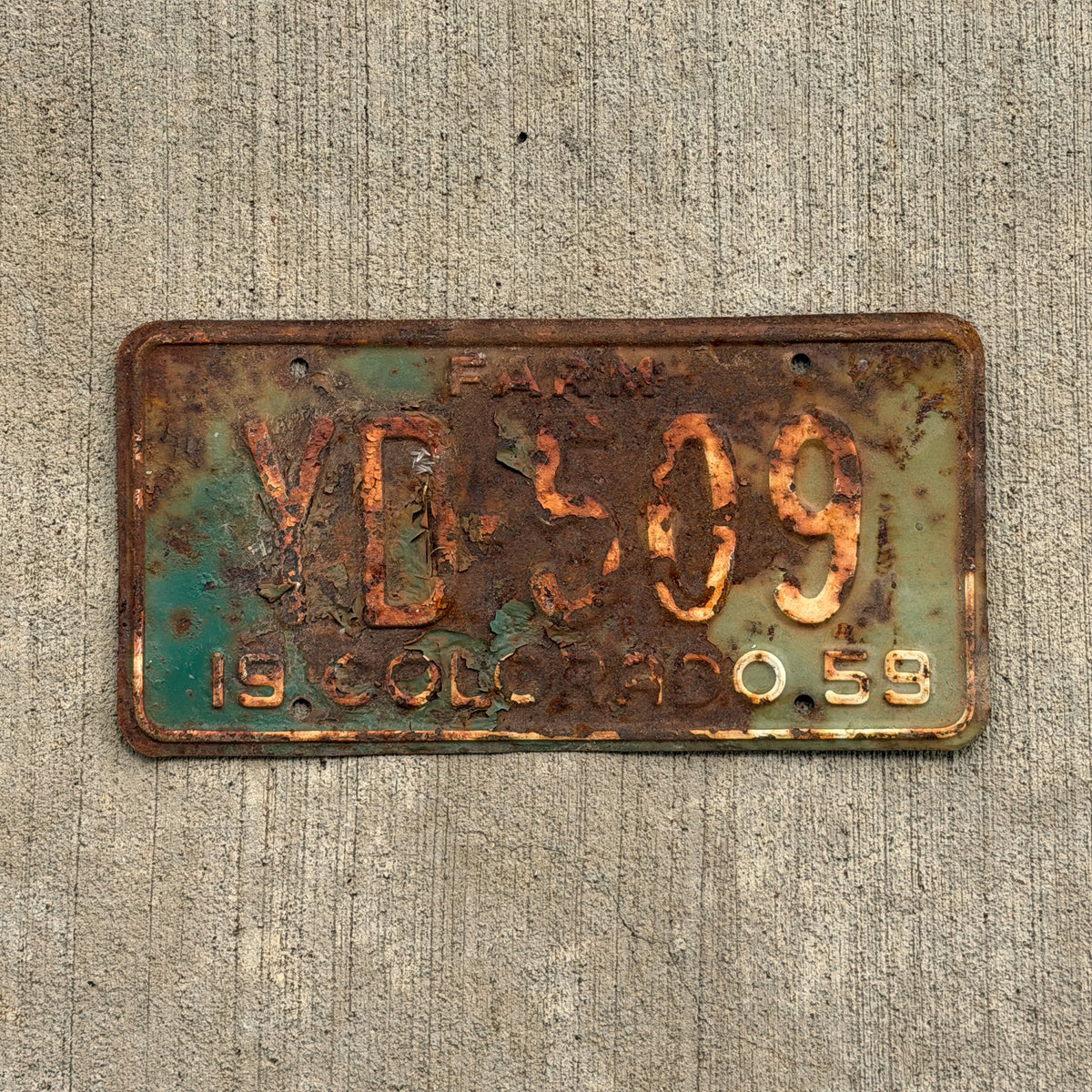 Photo of a 1959 Colorado Farm Truck License Plate Auto Tag Garage Decor Vintage YD 509 with original patina