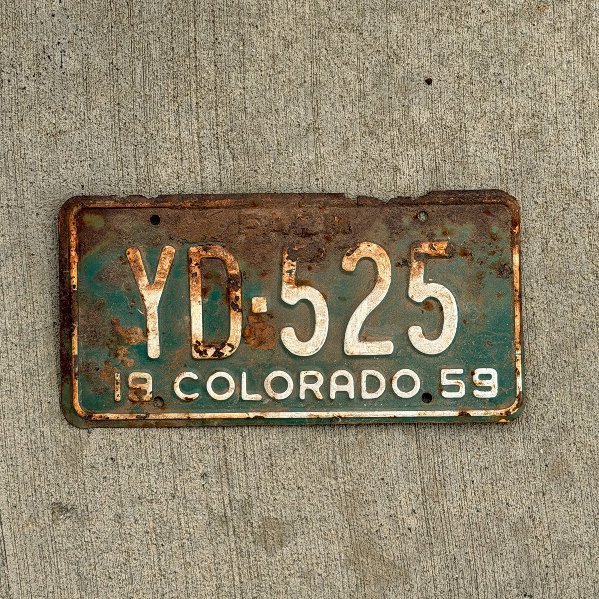 Photo of a 1959 Colorado Farm Truck License Plate Auto Tag Garage Decor Vintage YD 525 with original patina