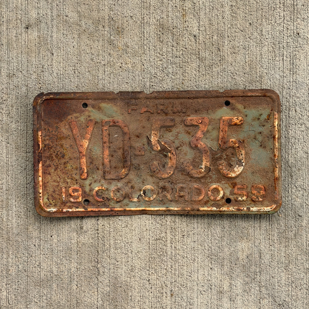 Photo of a 1959 Colorado Farm Truck License Plate Auto Tag Garage Decor Vintage YD 535 with original patina