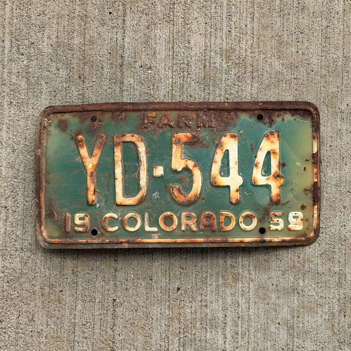 Photo of a 1959 Colorado Farm Truck License Plate Auto Tag Garage Decor Vintage YD 544 with original patina