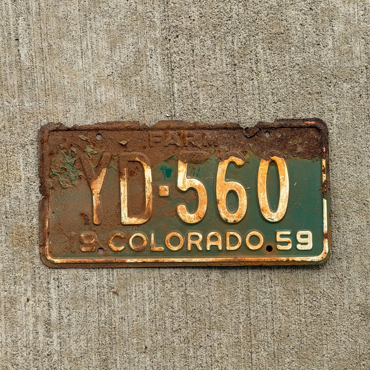 Photo of a 1959 Colorado Farm Truck License Plate Auto Tag Garage Decor Vintage YD 560 with original patina