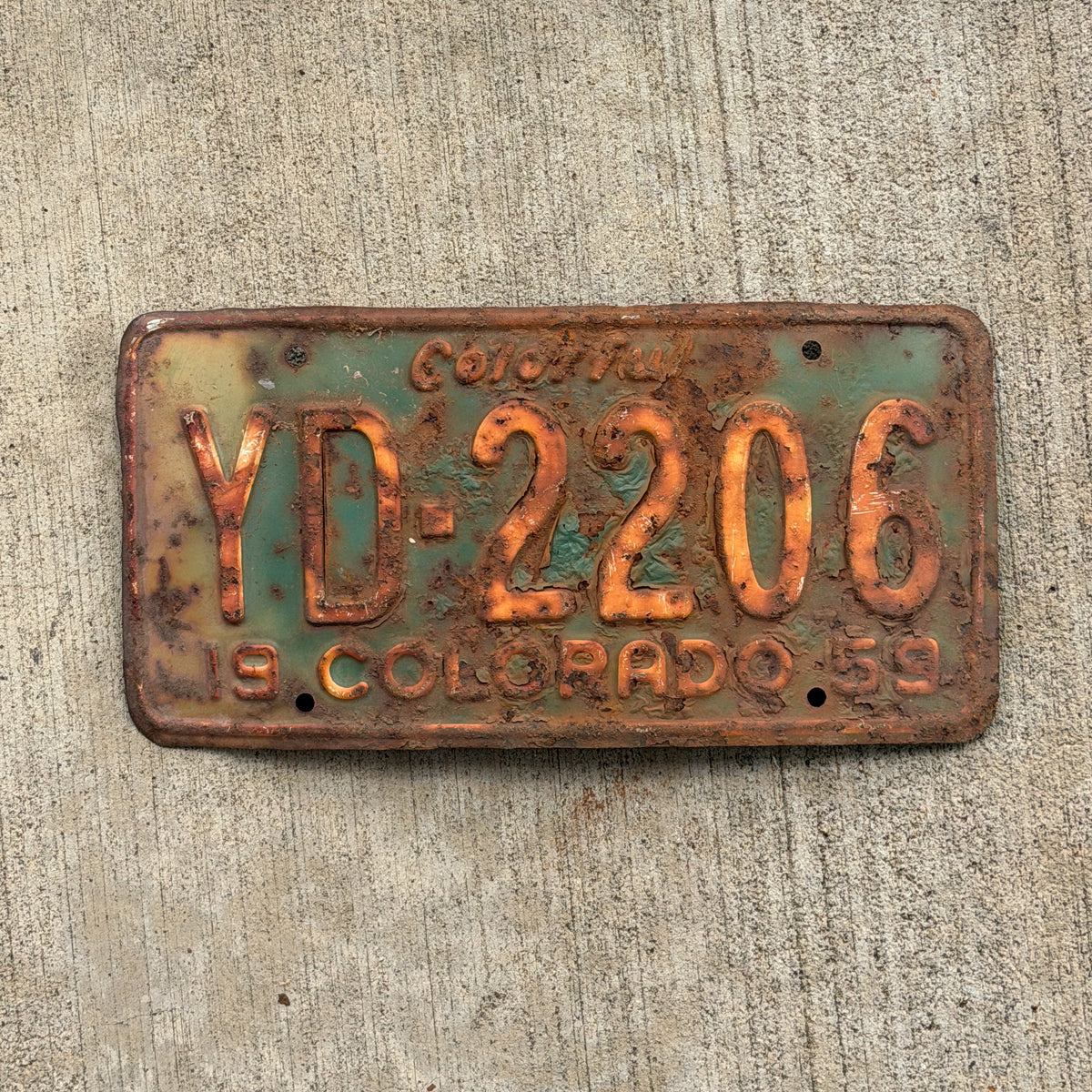 Photo of a 1959 Colorado License Plate Auto Tag Garage Decor Vintage YD 2206 with original patina