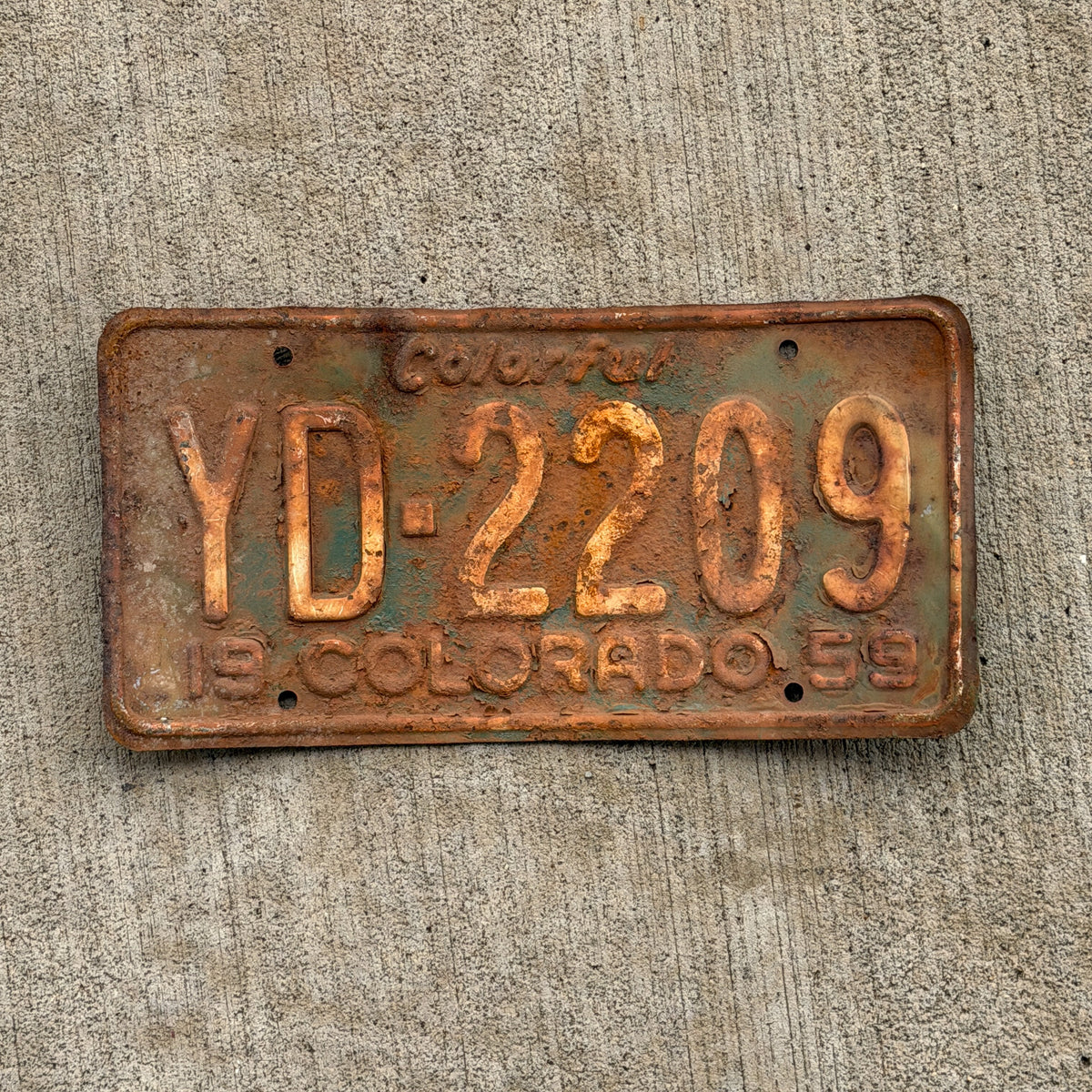 Photo of a 1959 Colorado License Plate Auto Tag Garage Decor Vintage YD 2209 with original patina